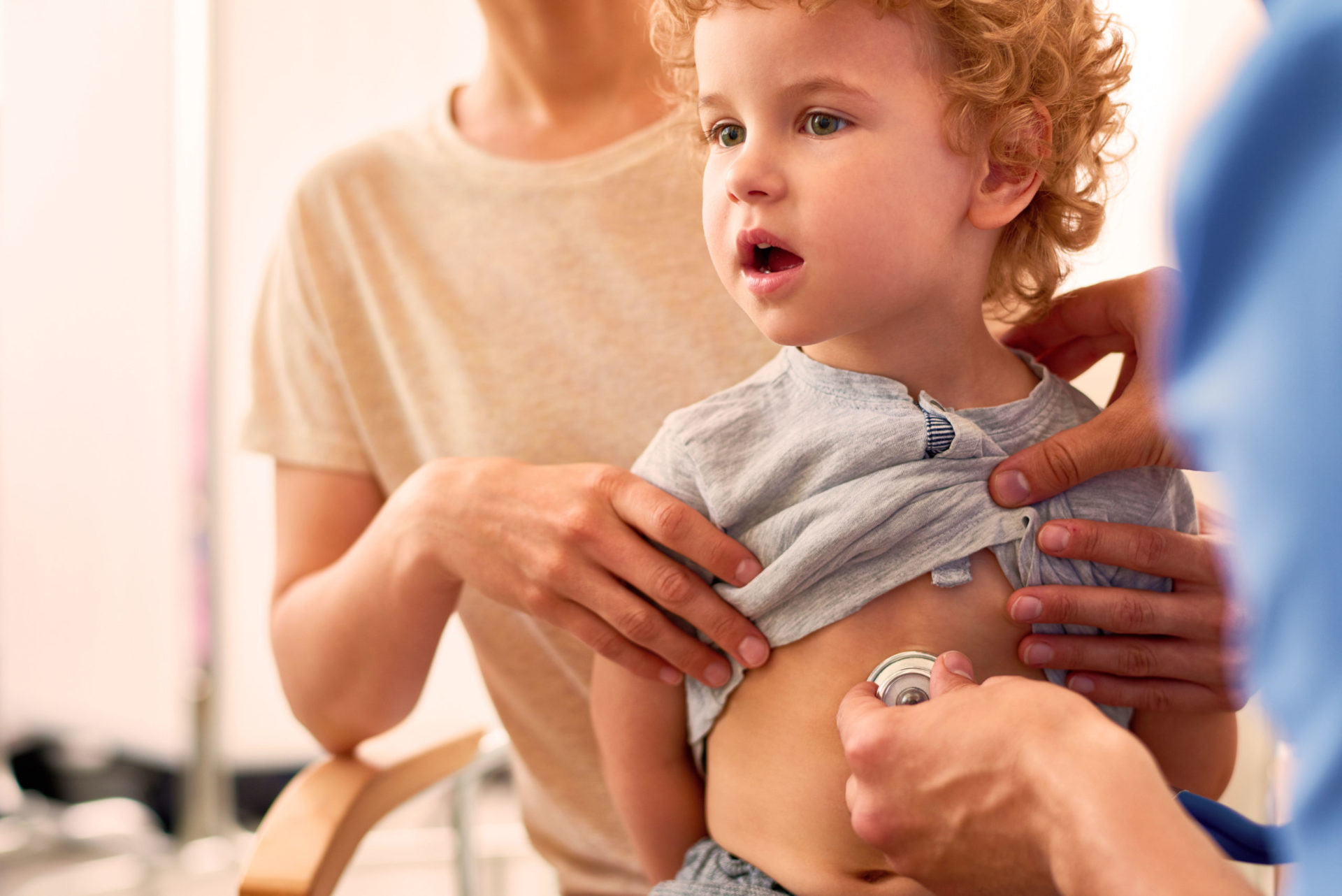 Toddler getting a checkup with the stethoscope