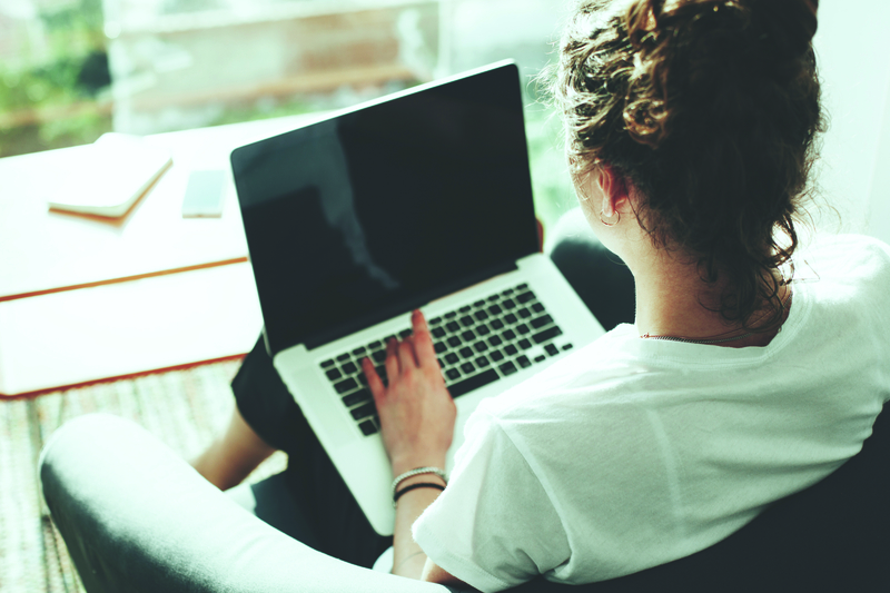 A woman using a laptop