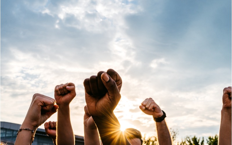 Fists in the air in solidarity